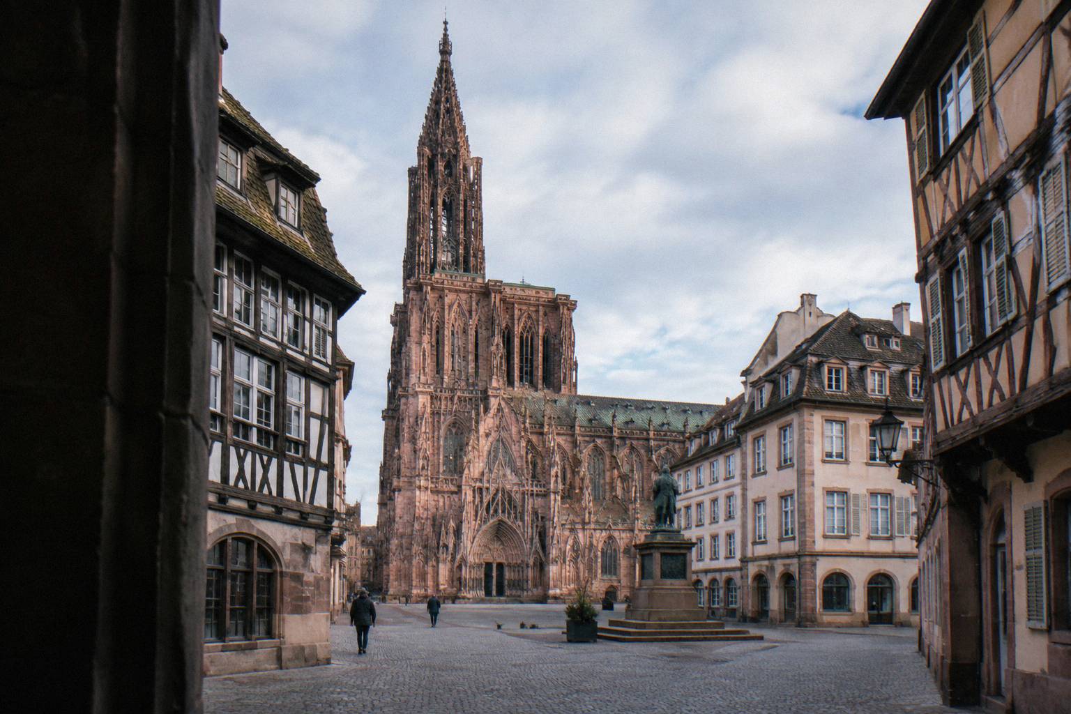 A cobbled historic square with pale facades in central Strasbourg