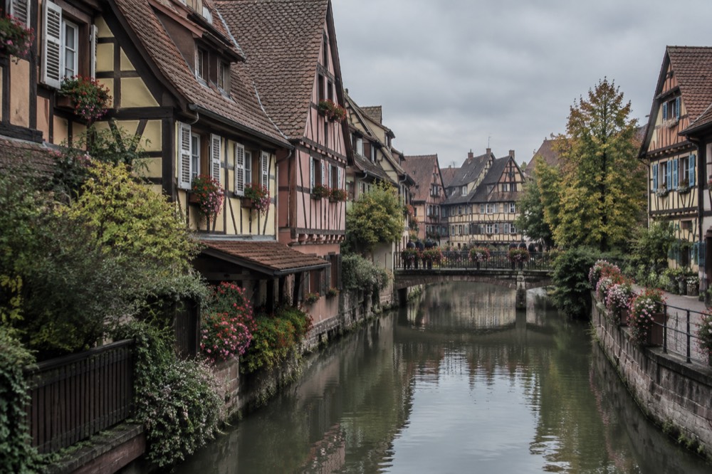 Half-timbered houses along a quiet canal in Colmar's old quarter