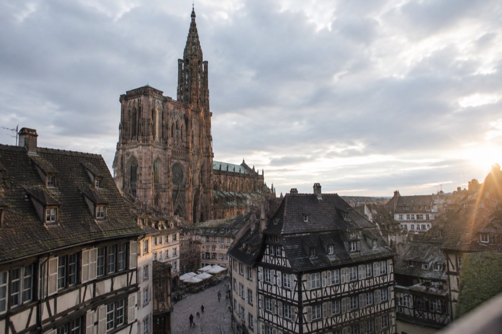 The Gothic cathedral spire rising above the rooftops of Strasbourg's old town