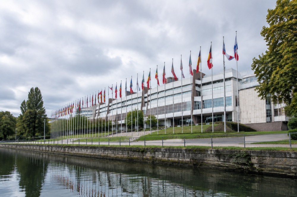 Rows of member-state flags outside the Council of Europe building in Strasbourg