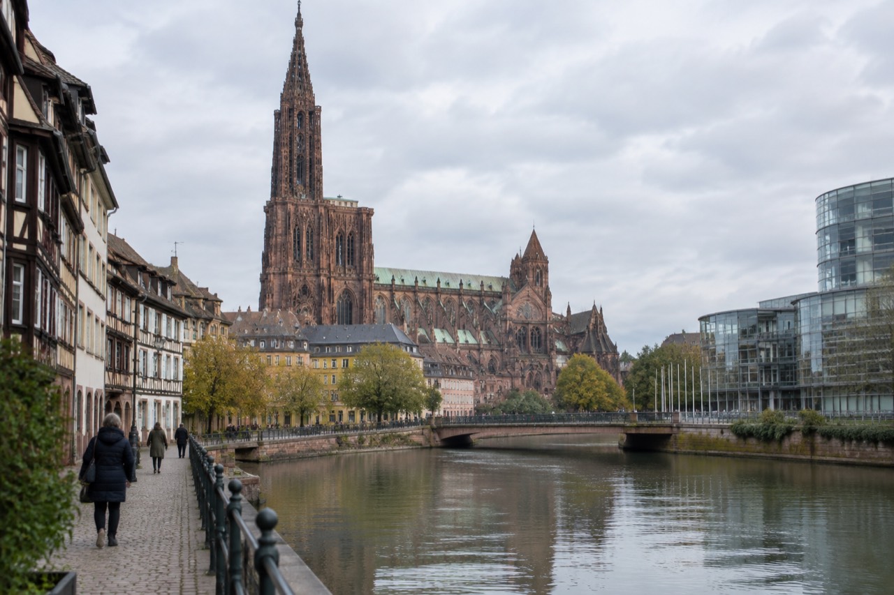 Modern glass and steel European institution buildings beside the River Ill in Strasbourg