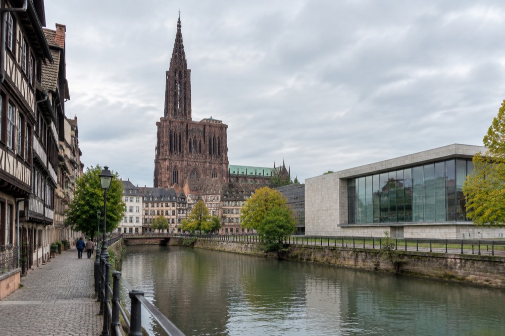Modern art museum building beside water in Strasbourg