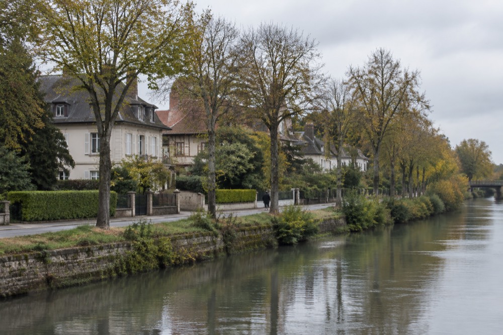 Tree-lined street of comfortable residences beside the River Ill in the Robertsau quarter of Strasbourg