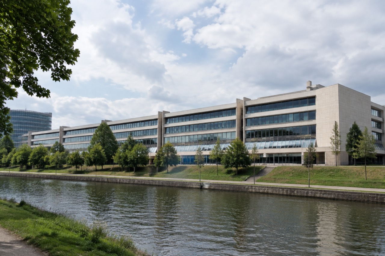 The modern facade of the Council of Europe building beside the water in Strasbourg