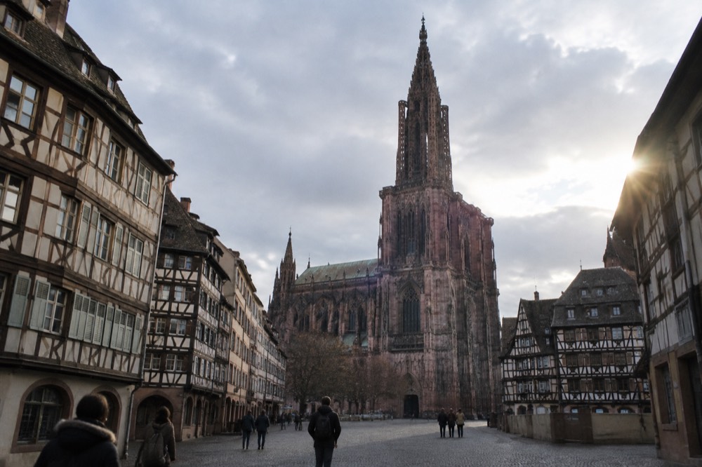 Cobblestone street with half-timbered houses in central Strasbourg
