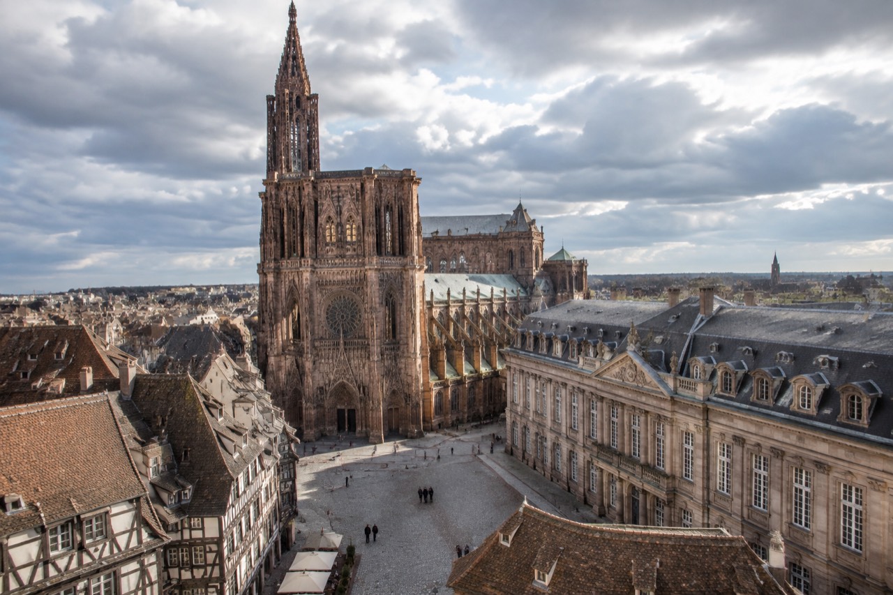 The long classical facade of Palais Rohan beside the cathedral in Strasbourg
