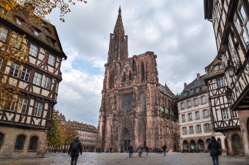 Autumn light on the buildings around an open square in central Strasbourg
