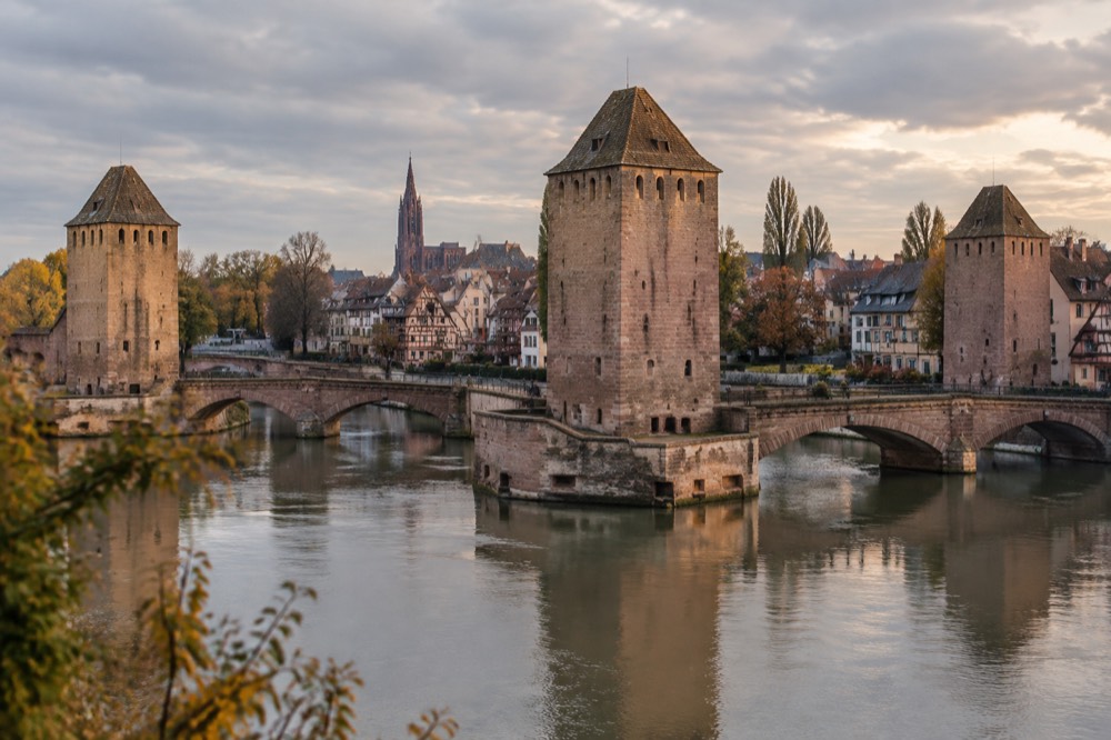 Covered bridges and square towers over the River Ill in Strasbourg