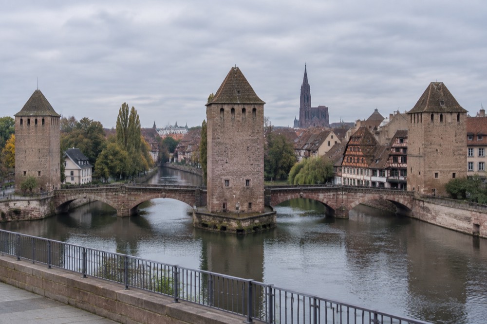 View from the Barrage Vauban terrace across the covered bridges and Petite France rooftops