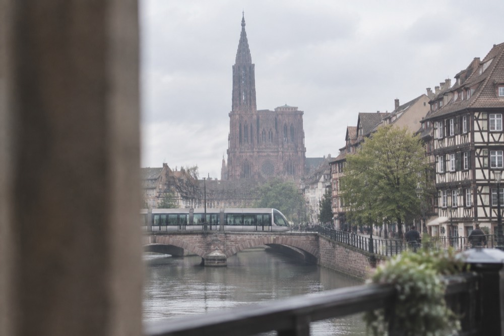 Tram crossing a bridge over the Ill in central Strasbourg
