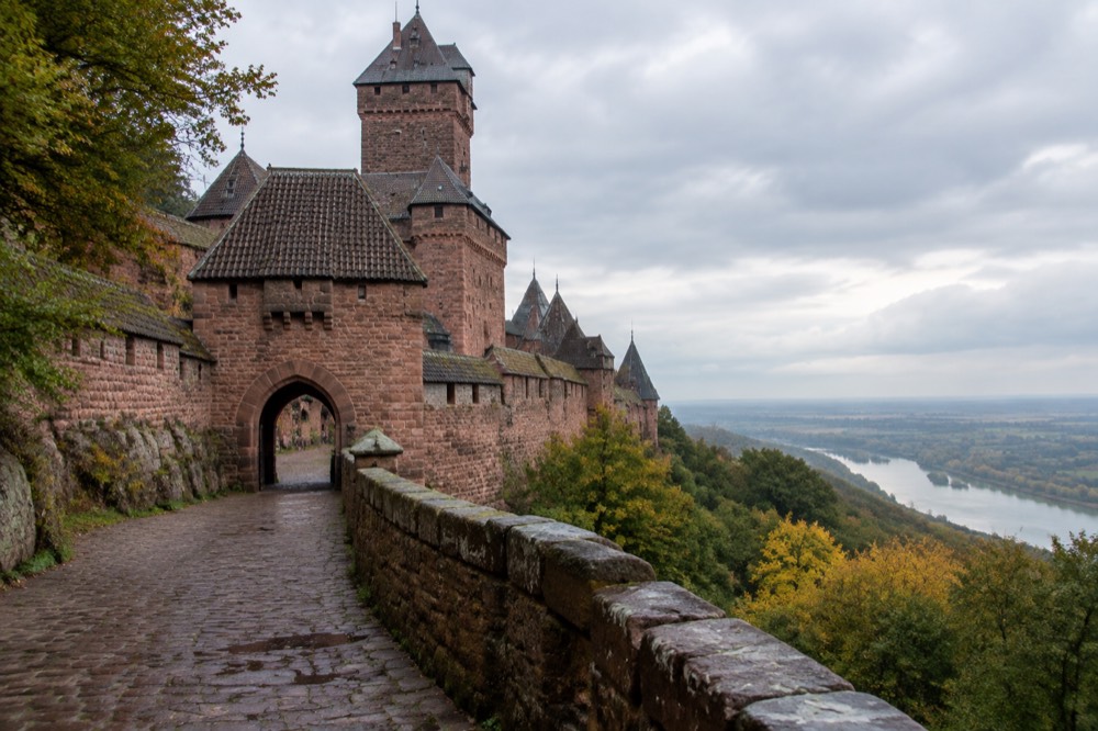 A stone ramp and fortified gateway leading up to the castle entrance