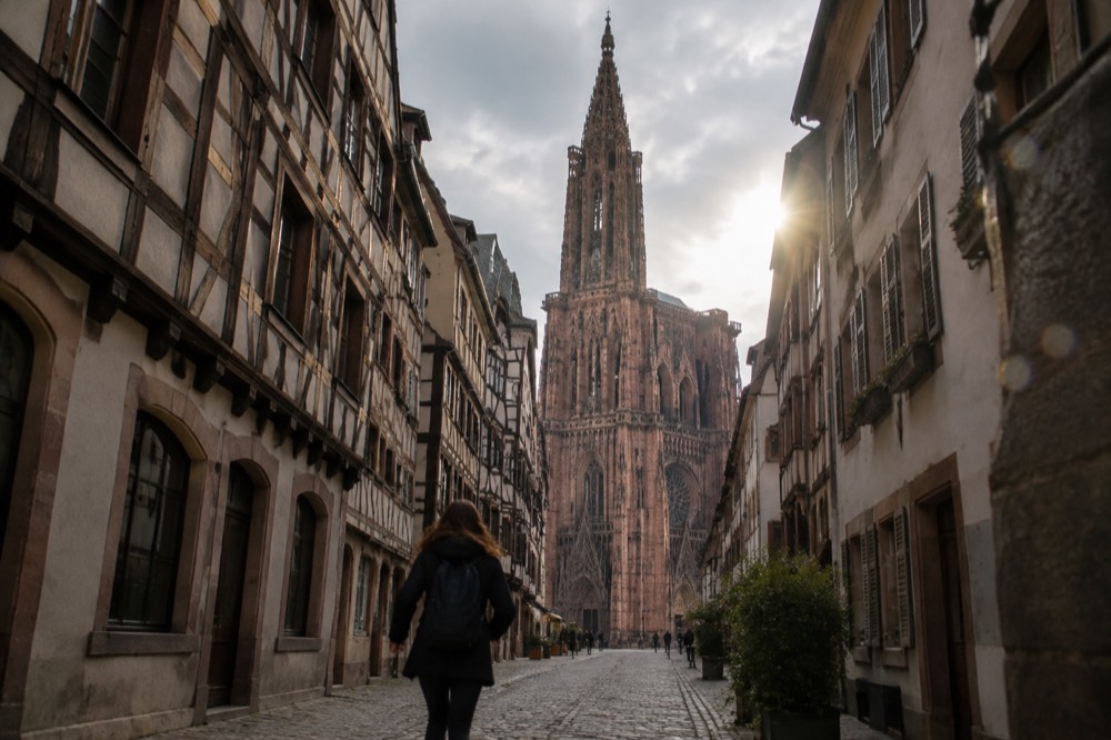 The single spire of Strasbourg Cathedral rising above the rooftops of the old town