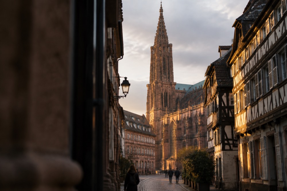 Illuminated half-timbered street in the evening in Strasbourg