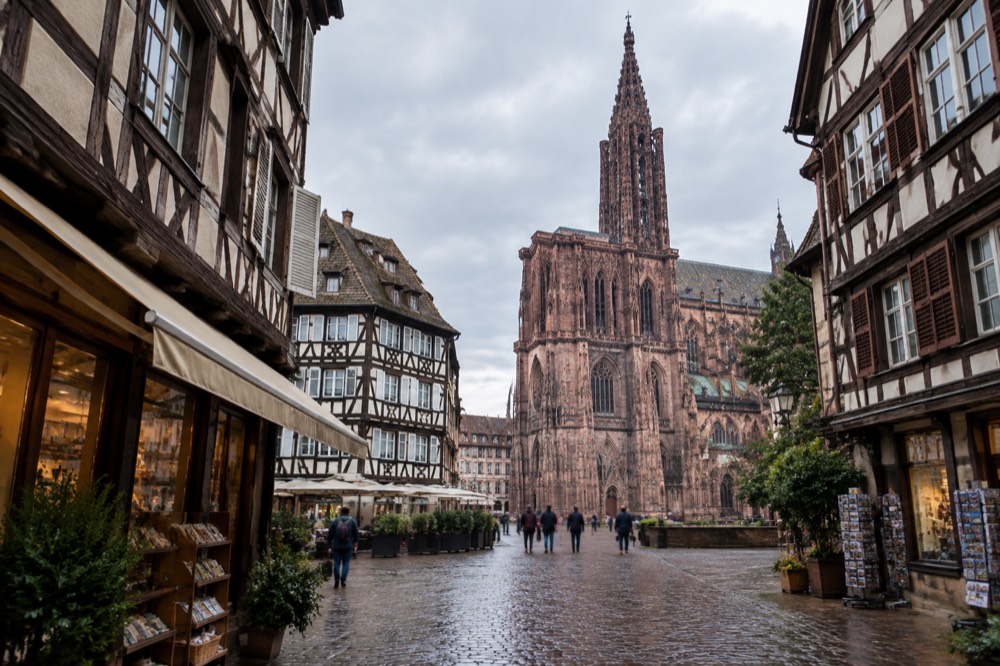 Timber-framed shop fronts on a square in central Strasbourg