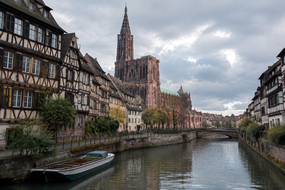 A boat resting on the River Ill beside the old tanners quarter of Strasbourg
