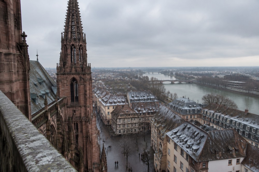 View from the cathedral platform over frosted rooftops toward the Rhine plain