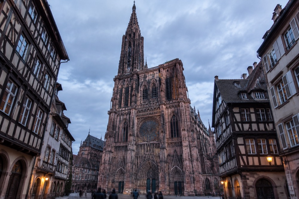 Sandstone Gothic facade of Strasbourg Cathedral seen from Place du Château