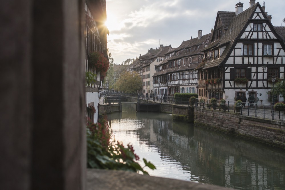 Half-timbered houses along a calm canal in Strasbourg's Petite France quarter
