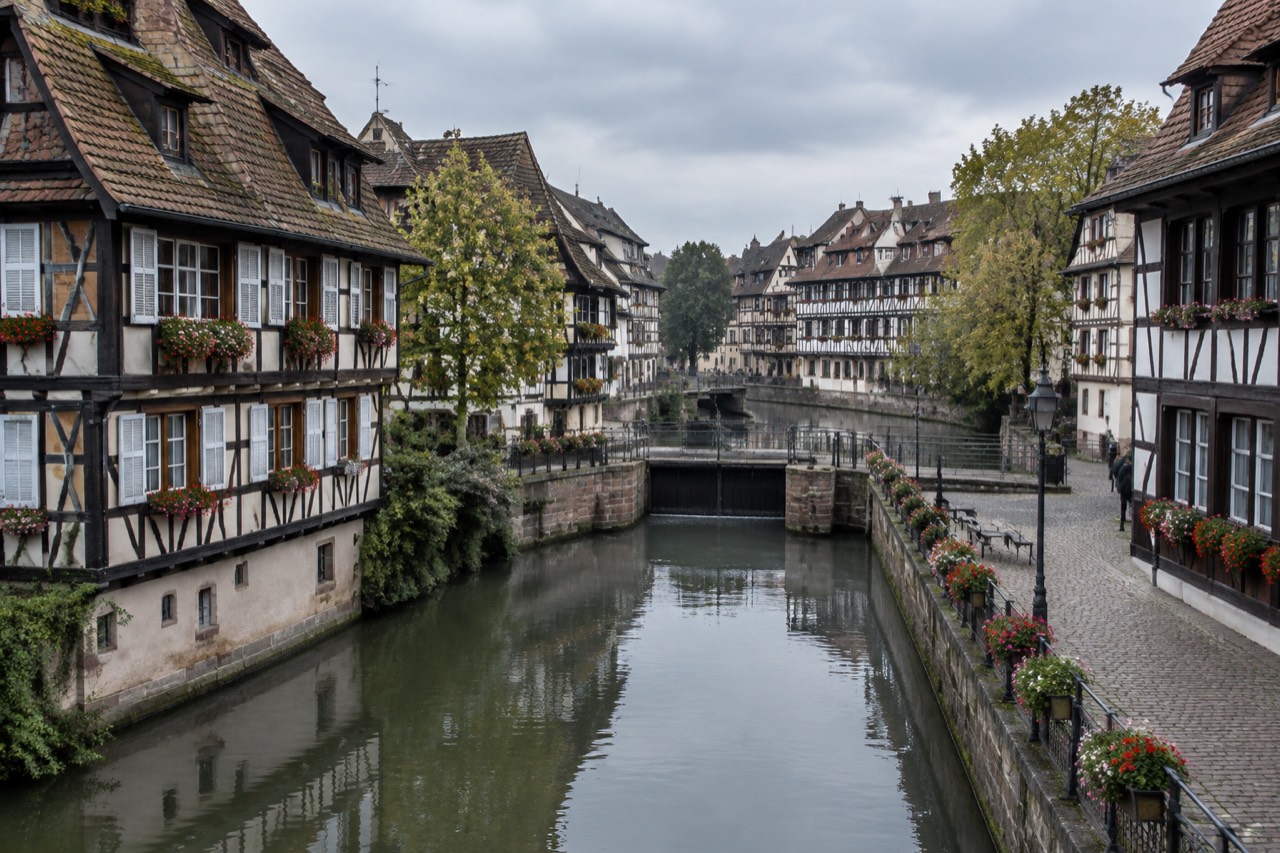 Half-timbered houses along a calm canal in Strasbourg's Petite France quarter