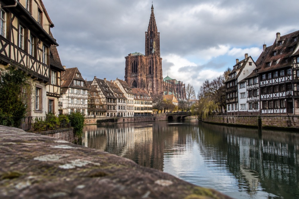 Half-timbered houses reflected in the River Ill in Strasbourg